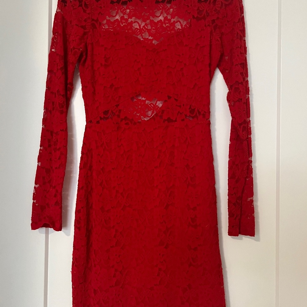 Red lace dress with long sleeves and cutout in back